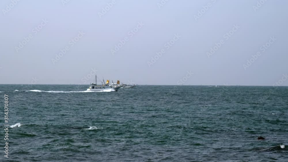 Some of the boats sailing on the Koijigahama Beach Some of the boats sailing on the Koijigahama Beach