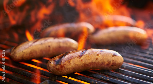 Photography tasty bratwurst sausage barbecuing on the grill