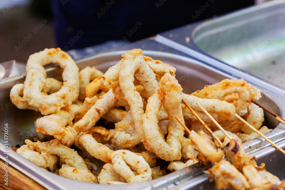 Deep fried squid rings at street makret Deep fried squid rings at street makret