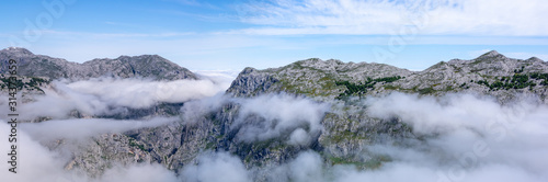 Picos de Europa - Panorama with clouds beneath mountains