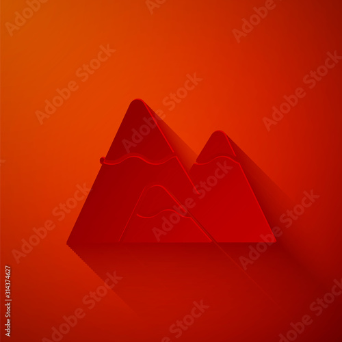 Paper cut Mountains icon isolated on red background. Symbol of victory or success concept. Paper art style. Vector Illustration