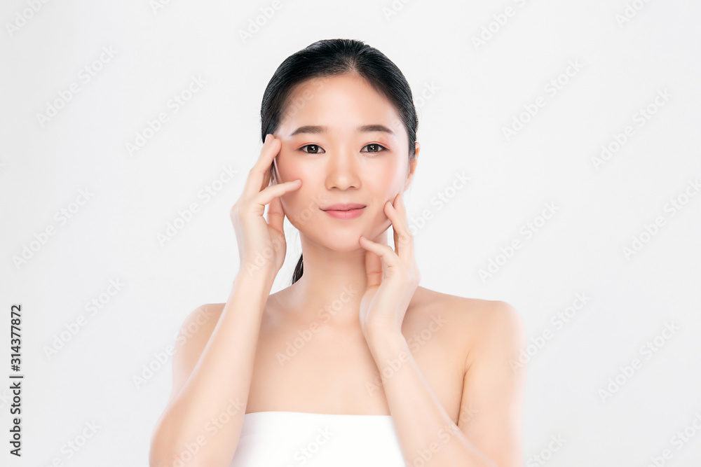 Beautiful Young Asian Woman with Clean Fresh Skin. Face care, Facial treatment, on white background, Beauty and Cosmetics Concept. Beautiful Young Asian Woman with Clean Fresh Skin. Face care, Facial treatment, on white background, Beauty and Cosmetics Concept.