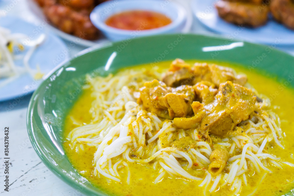 Kanomjeen rice noodle with thai curry with chicken Kanomjeen rice noodle with thai curry with chicken