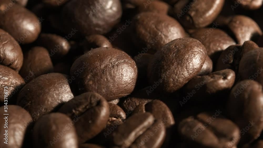 Brown roasted coffee beans. Close up Brown roasted coffee beans. Close up