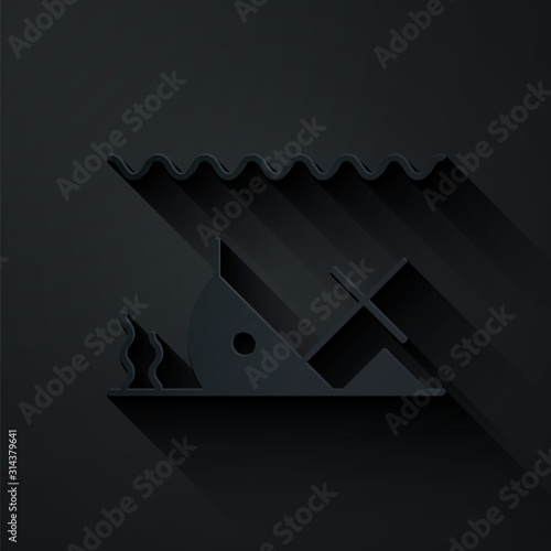 Paper cut Sunken ship at the bottom of the sea icon isolated on black background. Paper art style. Vector Illustration