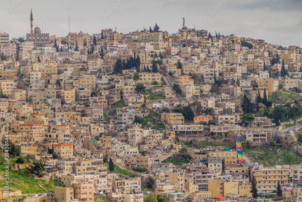 Skyline of Amman with houses on steep slopes, Jordan.