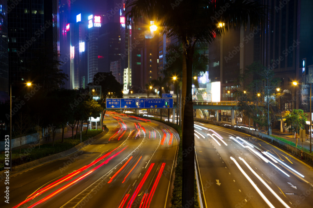 Trails on the highway in Hong kong during evening