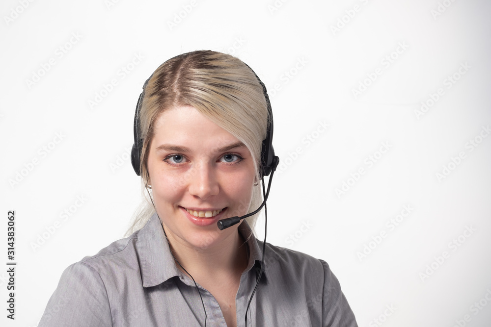 Portrait of attractive business woman with headset isolated over white background with large area for your text. Portrait of attractive business woman with headset isolated over white background with large area for your text.