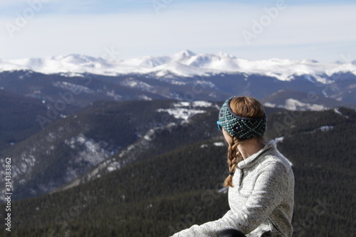 woman on top of mountain