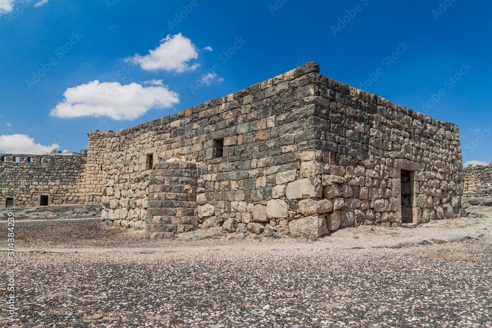 Ruins of Qasr al-Azraq (Blue Fortress), fort located in the desert of eastern Jordan. Ruins of Qasr al-Azraq (Blue Fortress), fort located in the desert of eastern Jordan.