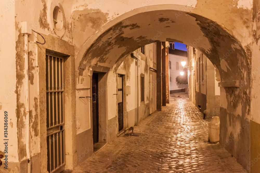 Evening view of a street in the Old Town (Cidade Velha) of Faro, Portugal.