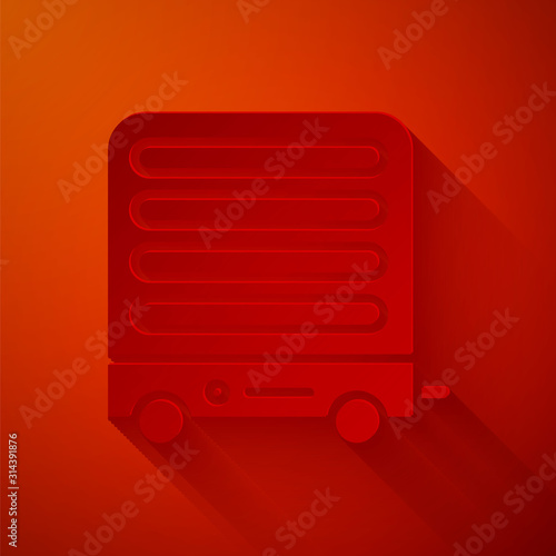 Paper cut Electric heater icon isolated on red background. Infrared floor heater with remote control. House climate control. Paper art style. Vector Illustration