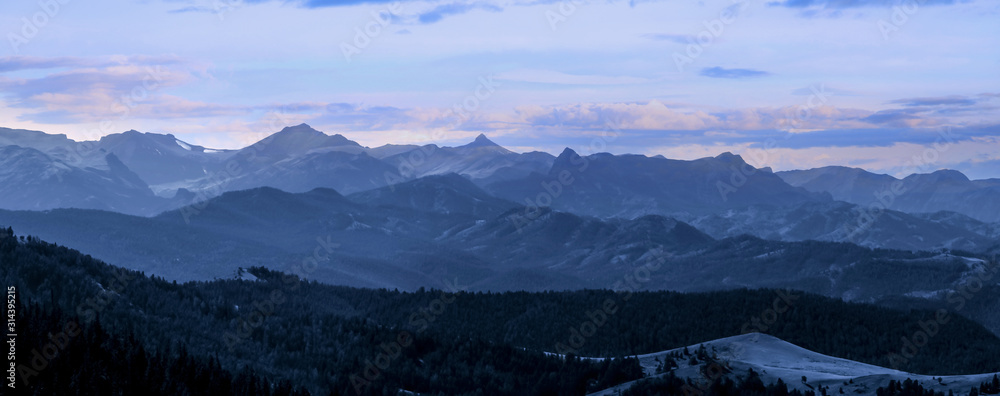Panoramic view of Rocky mountains in evening time
