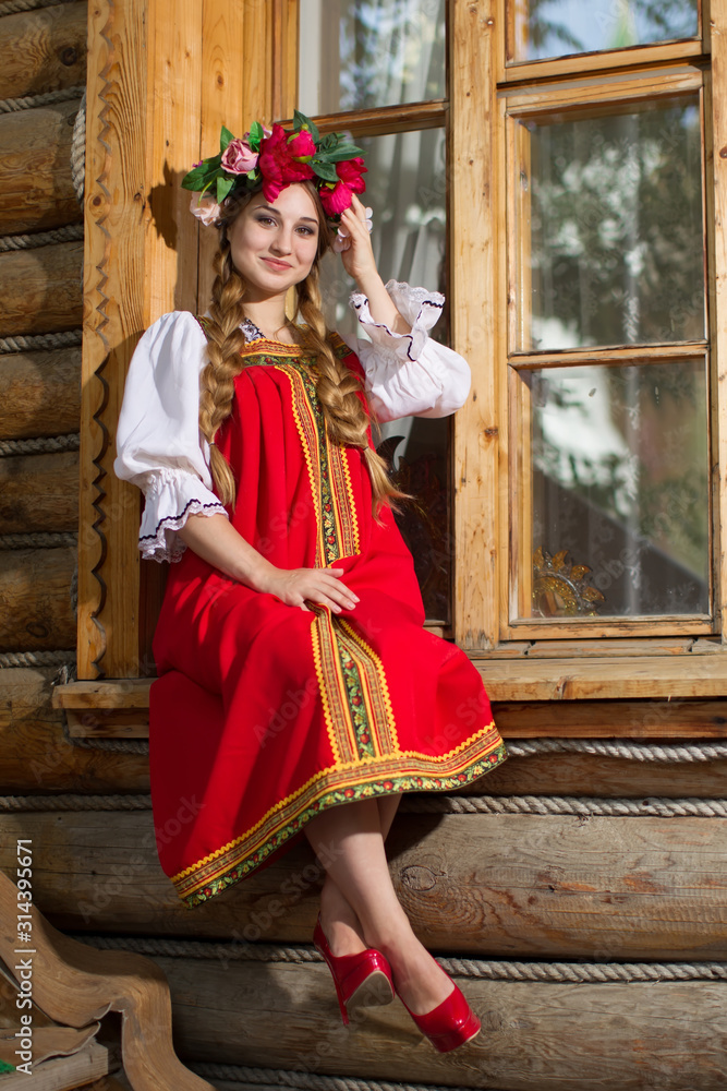 Russian style. Russian woman in national dress. Beautiful Slav