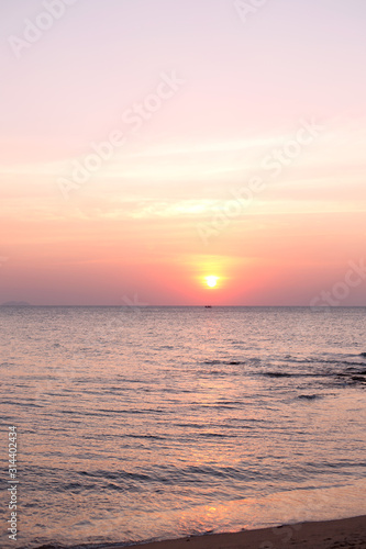 Sea pink sunset. Beautiful color clouds.