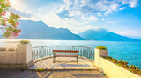 Bench on lakefront in Como Lake landscape. Bellagio Italy