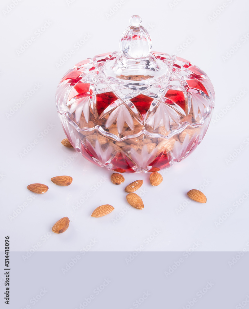 nuts or Almond nuts on a background new. nuts or Almond nuts on a background new.