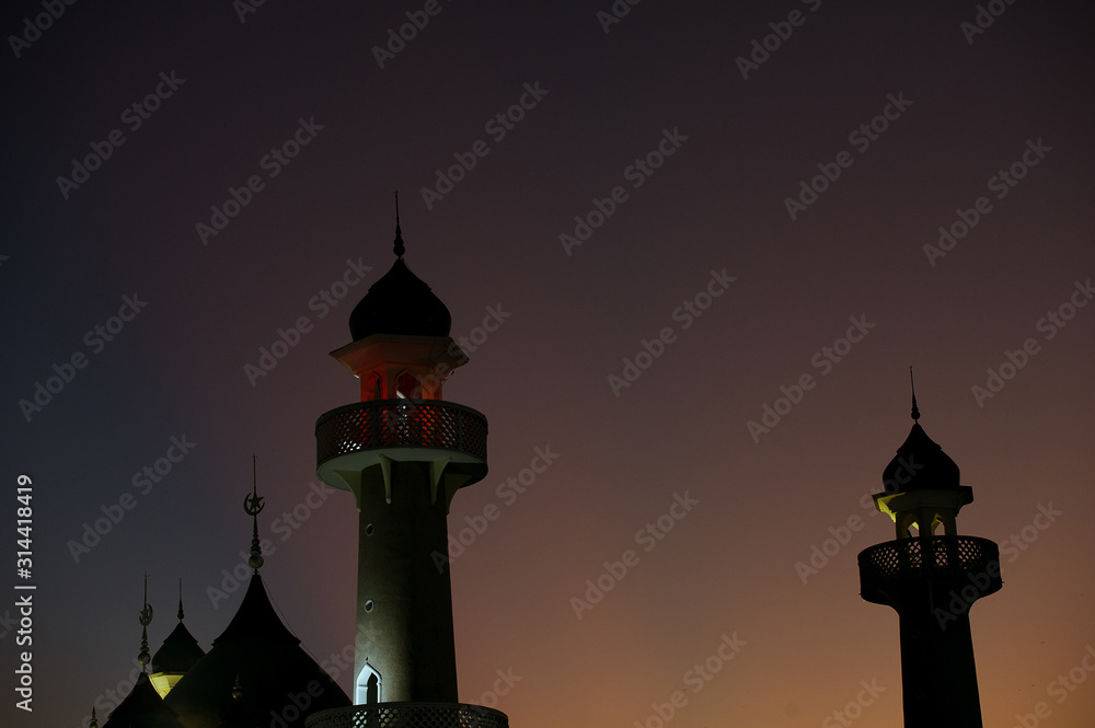 silhouette of muslim mosque dome on twilight background.concept for ramadan and prayer time background