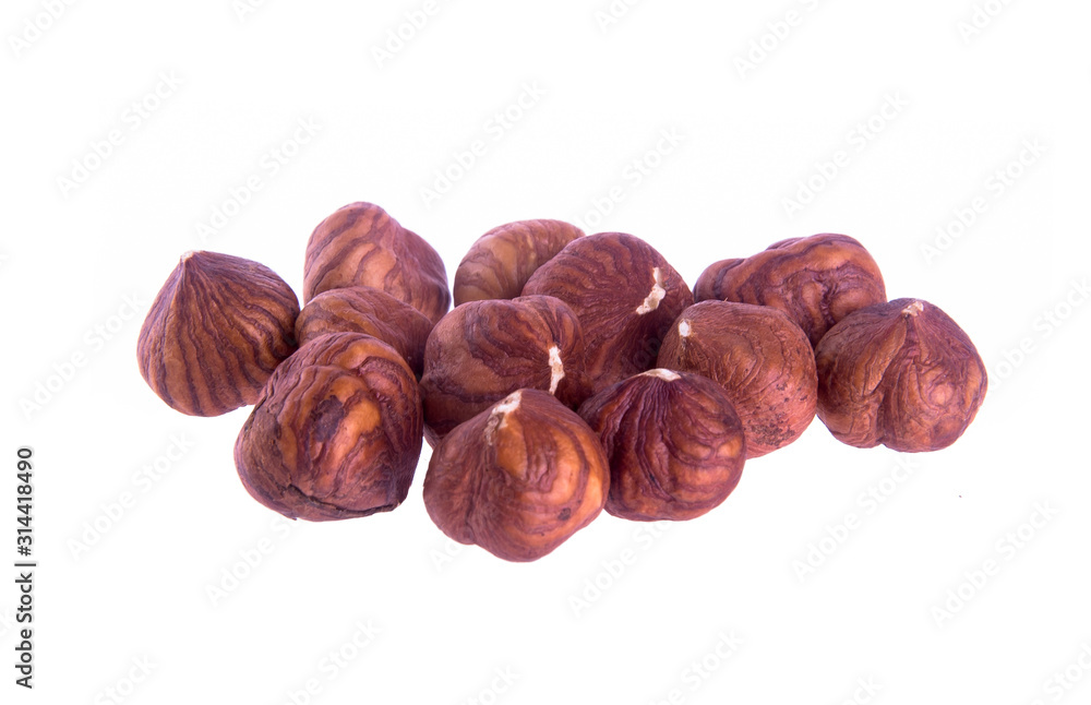 Obraz premium nuts or hazelnuts nuts on a background new.