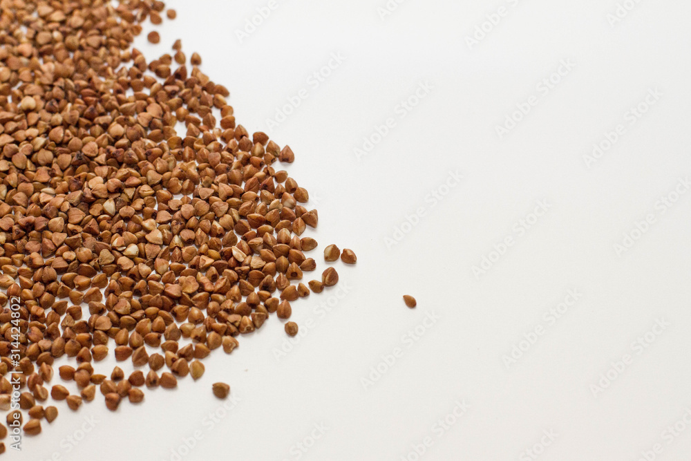 Buckwheat porridge on a White background. cereals and cereals. The view from the top. Space for text. delicious and healthy food and nutrition. vitamins for humans. Buckwheat porridge on a White background. cereals and cereals. The view from the top. Space for text. delicious and healthy food and nutrition. vitamins for humans.