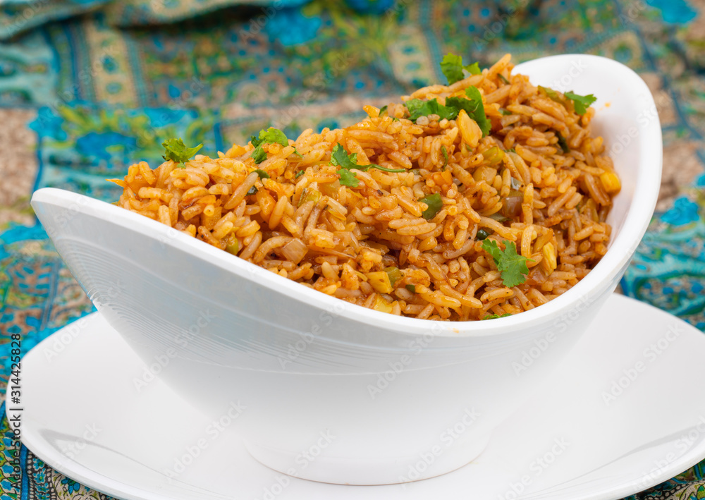 Vegetarian Fried Rice Or Pulav is a Dish of Cooked Rice That Has Been Stir-Fried in a Wok or a Frying Pan And is Usually Mixed with Other Ingredients Vegetarian Fried Rice Or Pulav is a Dish of Cooked Rice That Has Been Stir-Fried in a Wok or a Frying Pan And is Usually Mixed with Other Ingredients