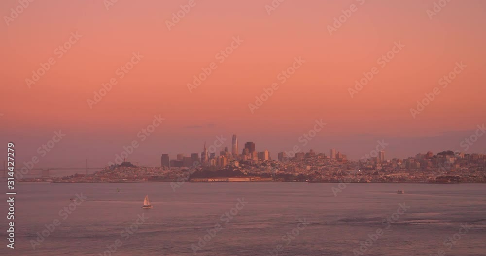 San Francisco city California, wide cityscape view of bay and buildings warm sun San Francisco city California, wide cityscape view of bay and buildings warm sun