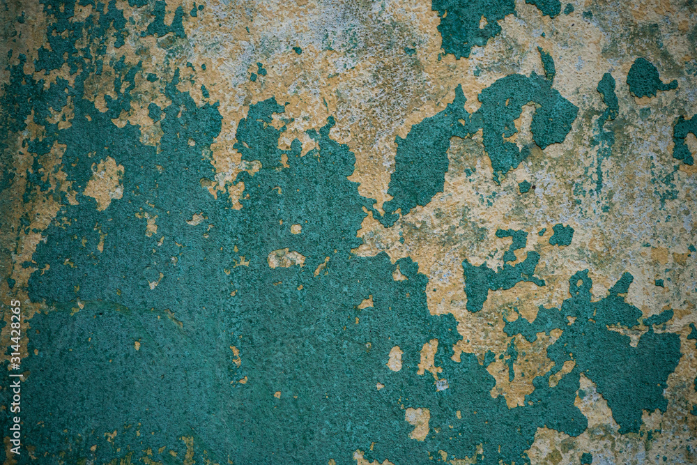 Texture of an old wall covered with paint. Background image of a worn paint coated surface Texture of an old wall covered with paint. Background image of a worn paint coated surface
