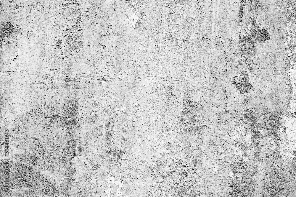 Fototapeta premium Texture of a concrete wall with cracks and scratches which can be used as a background
