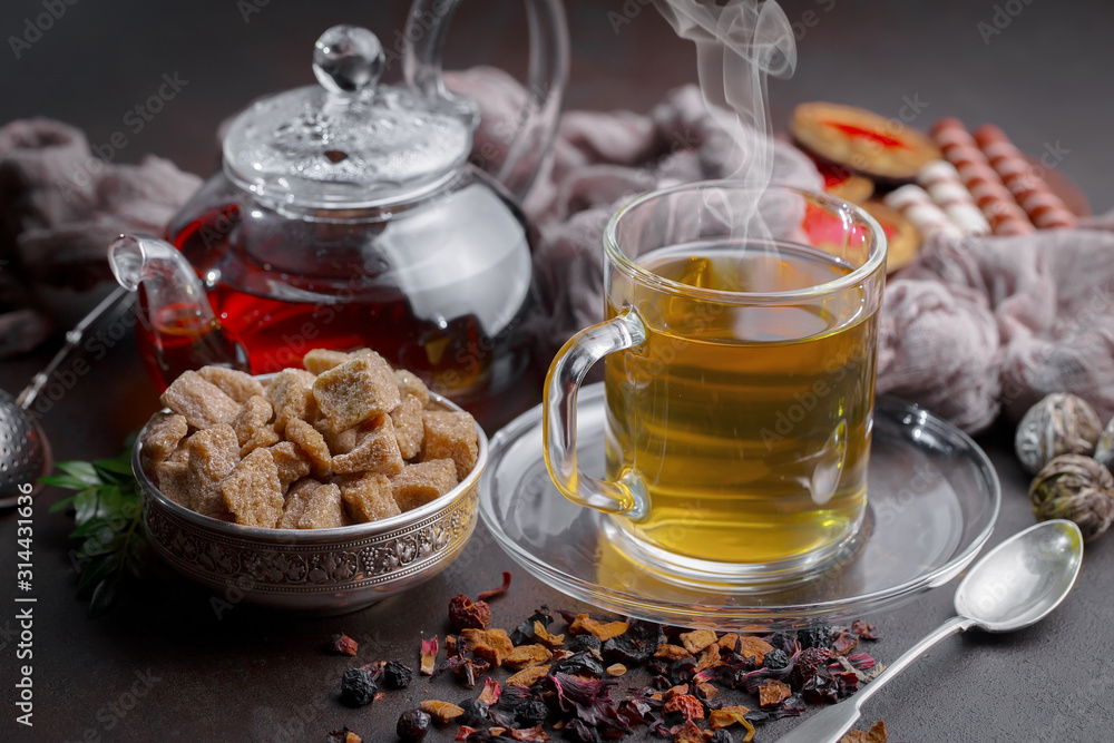 Tea in a cup on an old background Tea in a cup on an old background