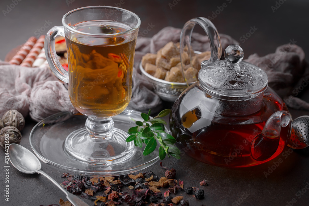 Tea in a cup on an old background Tea in a cup on an old background
