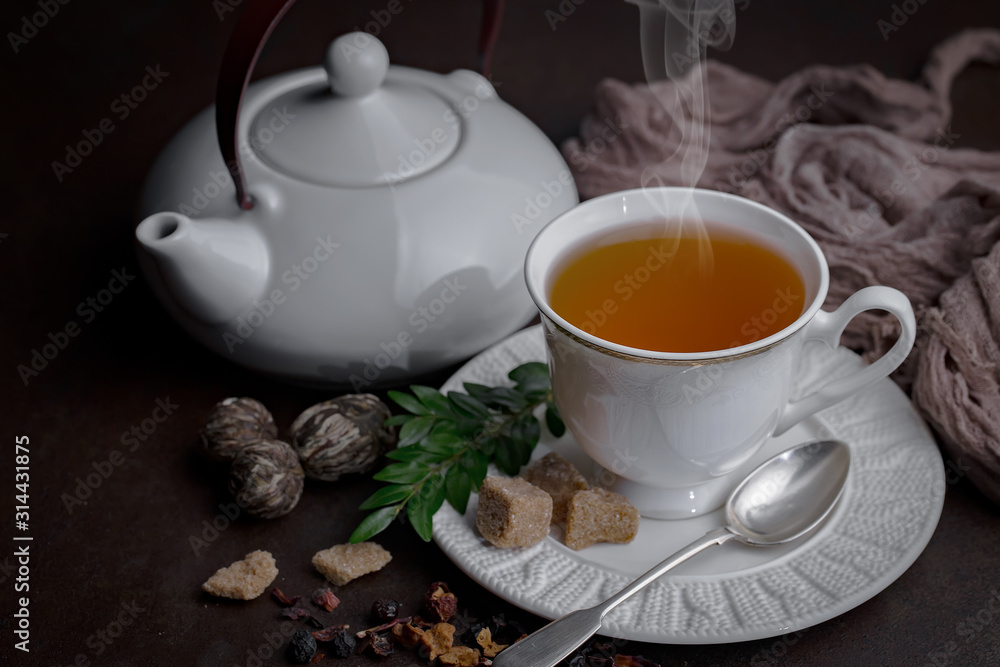 Tea in a cup on an old background Tea in a cup on an old background