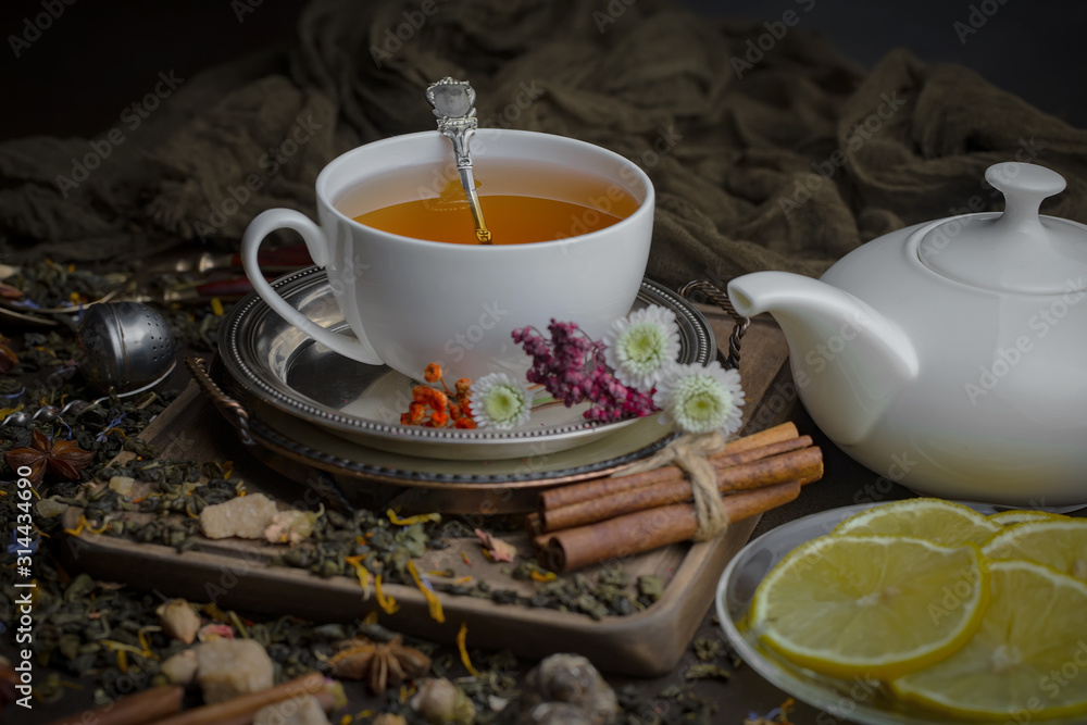 Tea in a cup on an old background Tea in a cup on an old background