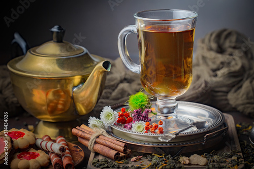 Tea in a cup on an old background