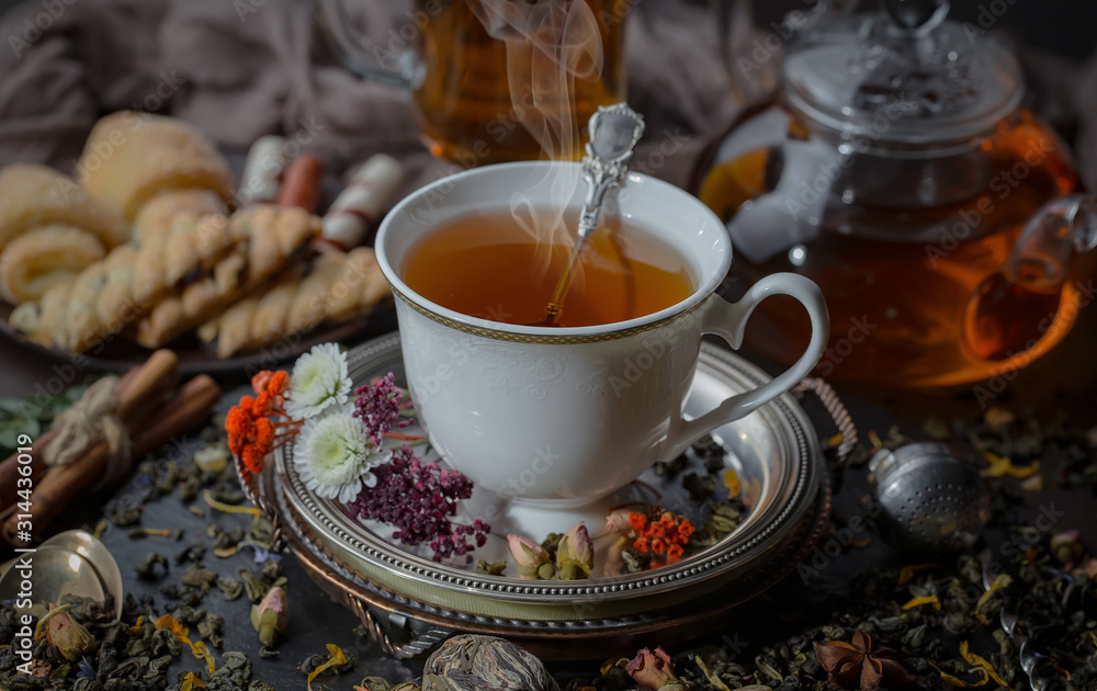 Tea in a cup on an old background Tea in a cup on an old background