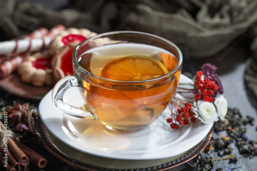Tea hot drink on old background in composition on the table Tea hot drink on old background in composition on the table
