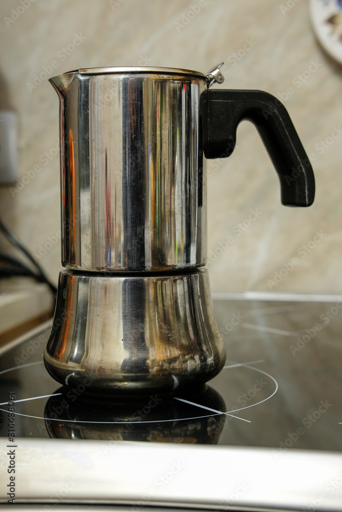 image of a geyser coffee maker standing on a stove image of a geyser coffee maker standing on a stove
