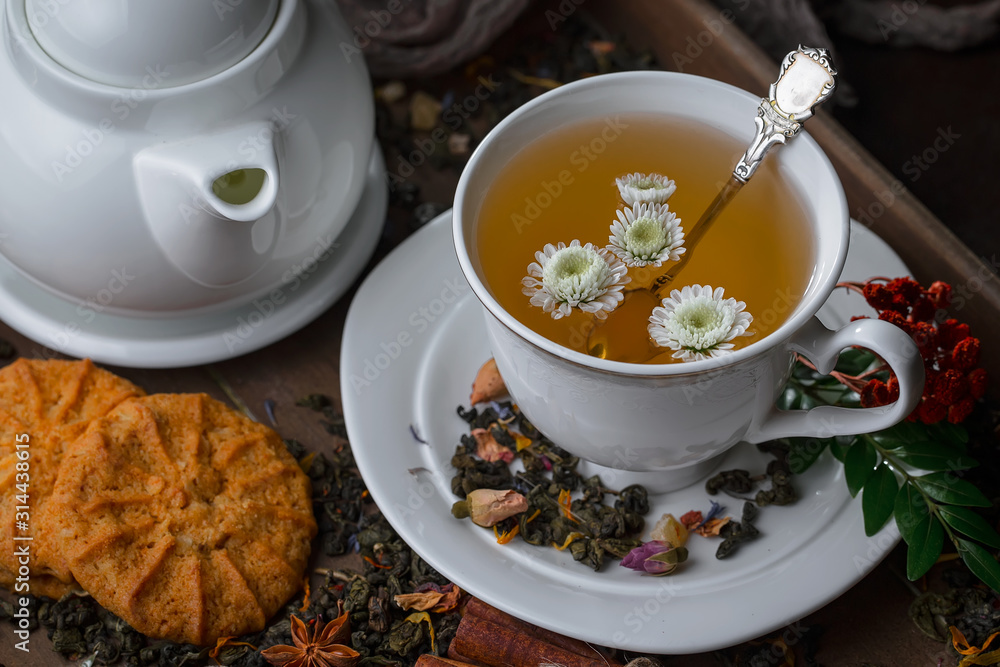 Tea hot drink on old background in composition on the table Tea hot drink on old background in composition on the table
