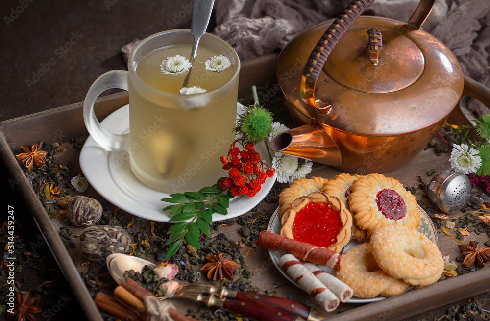 Fototapeta premium Tea in a cup on an old background