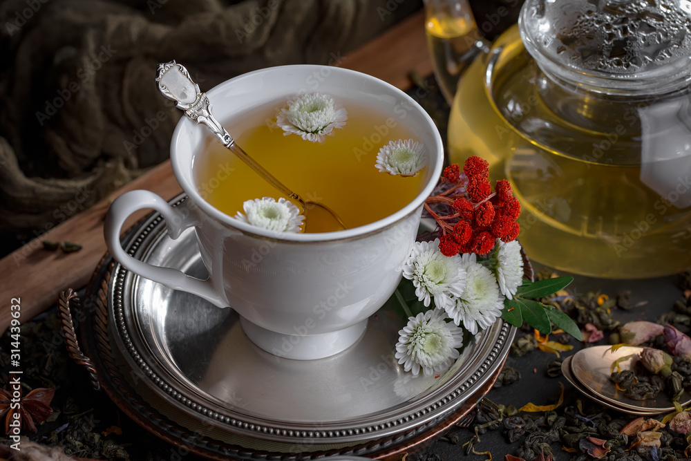 Tea hot drink on old background in composition on the table Tea hot drink on old background in composition on the table