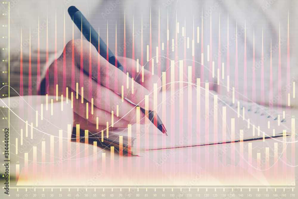 Forex chart displayed on woman's hand taking notes background. Concept of research. Double exposure Forex chart displayed on woman's hand taking notes background. Concept of research. Double exposure