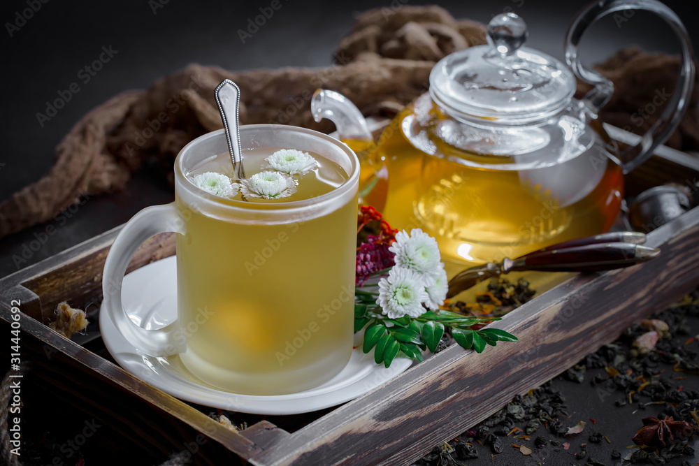 Tea hot drink on old background in composition on the table Tea hot drink on old background in composition on the table