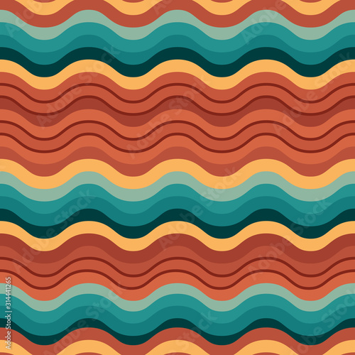 Seamless  wave ethnic pattern. Red blue and orange background. Seamless pattern for textile or wrapping paper. Positive colors. Abstract calm shapes