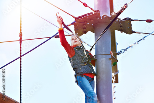 Photos Girl is climbing to amusement park