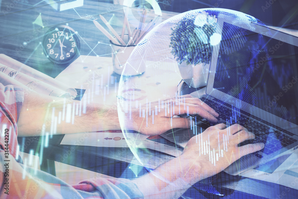 Double exposure of stock graph with businessman typing on computer in office on background. Concept of hard work. Double exposure of stock graph with businessman typing on computer in office on background. Concept of hard work.