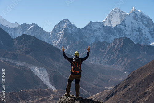 A trekker stand in front of Himalaya mountain range in Everest region, Nepal
