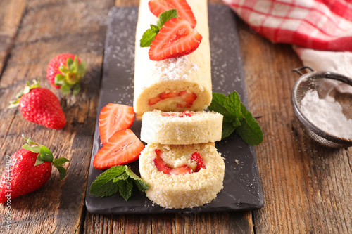 pastry roll with cream and strawberry