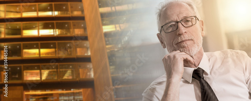 Fotografi Portrait of mature businessman; panoramic banner; multiple exposure