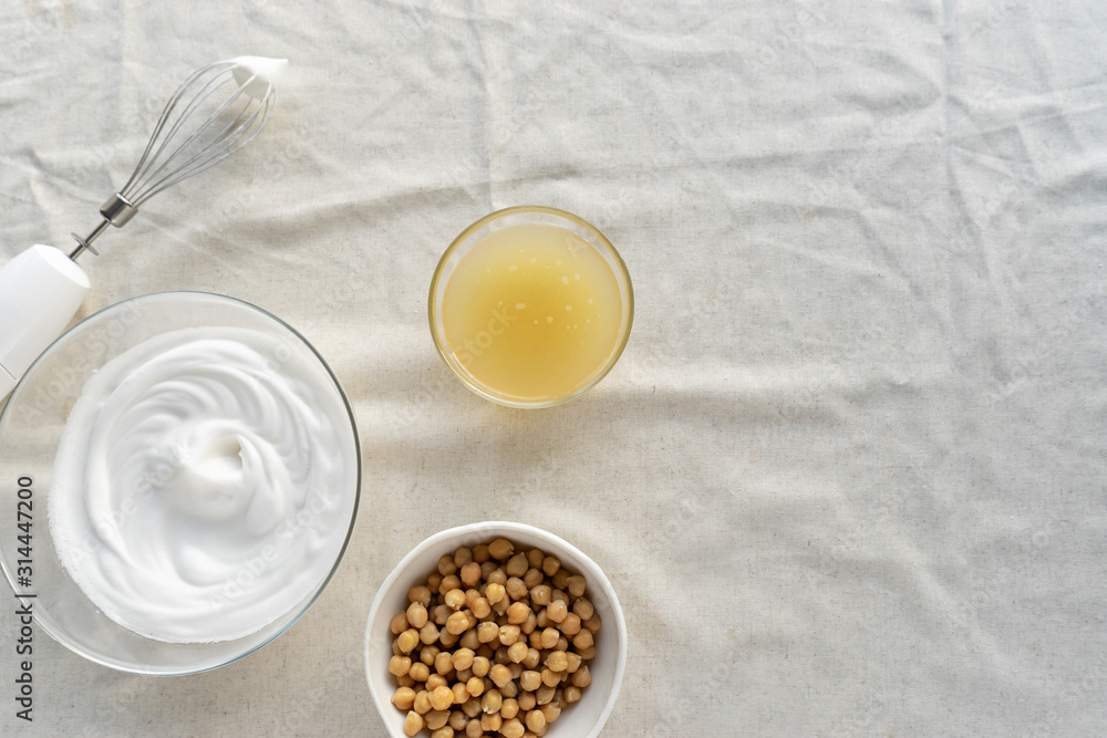 vegan cooking concept, egg replacement , chickpeas whipped aquafaba vegan cooking concept, egg replacement , chickpeas whipped aquafaba