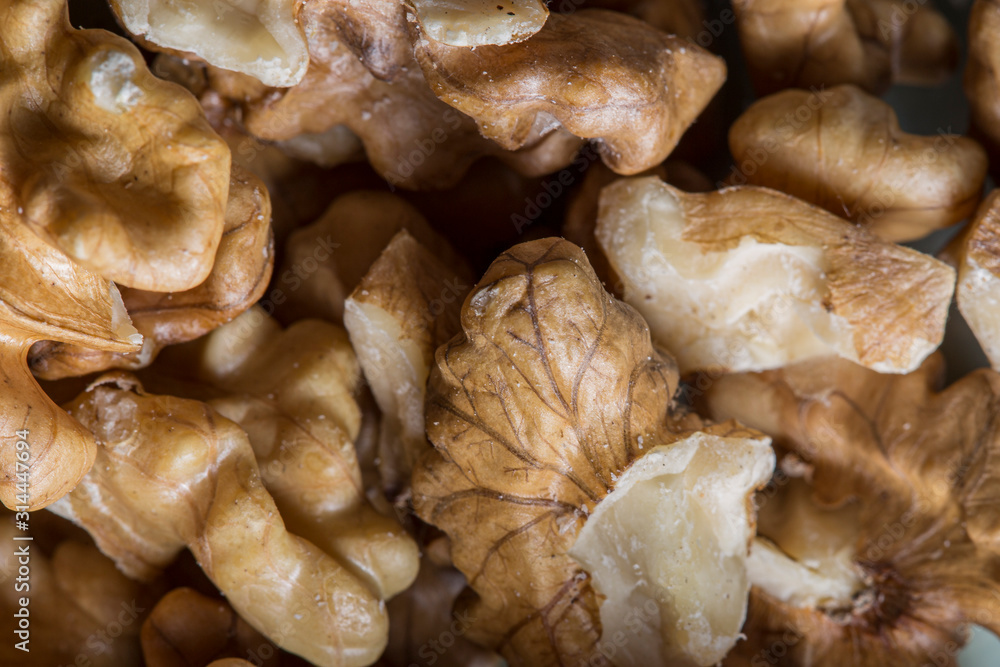 Many brown walnuts close up still Many brown walnuts close up still