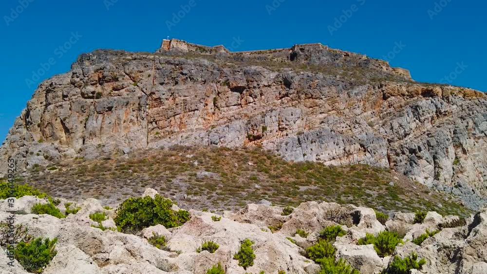 Rocks, mountain against the blue sky. Parallax effect, camera stabilized. Amazingly beautiful landscape of the island of Crete, Greece. Rocks, mountain against the blue sky. Parallax effect, camera stabilized. Amazingly beautiful landscape of the island of Crete, Greece.